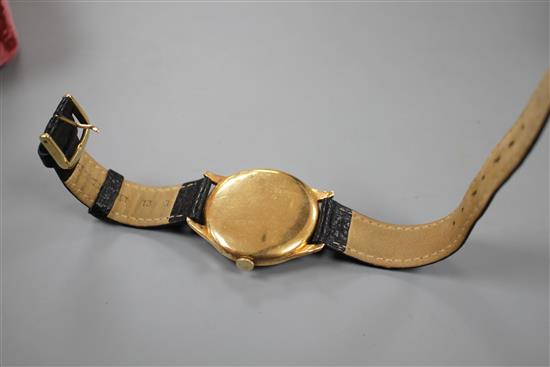 A gentlemans 1950s 18k yellow metal Omega manual wind wrist watch.
